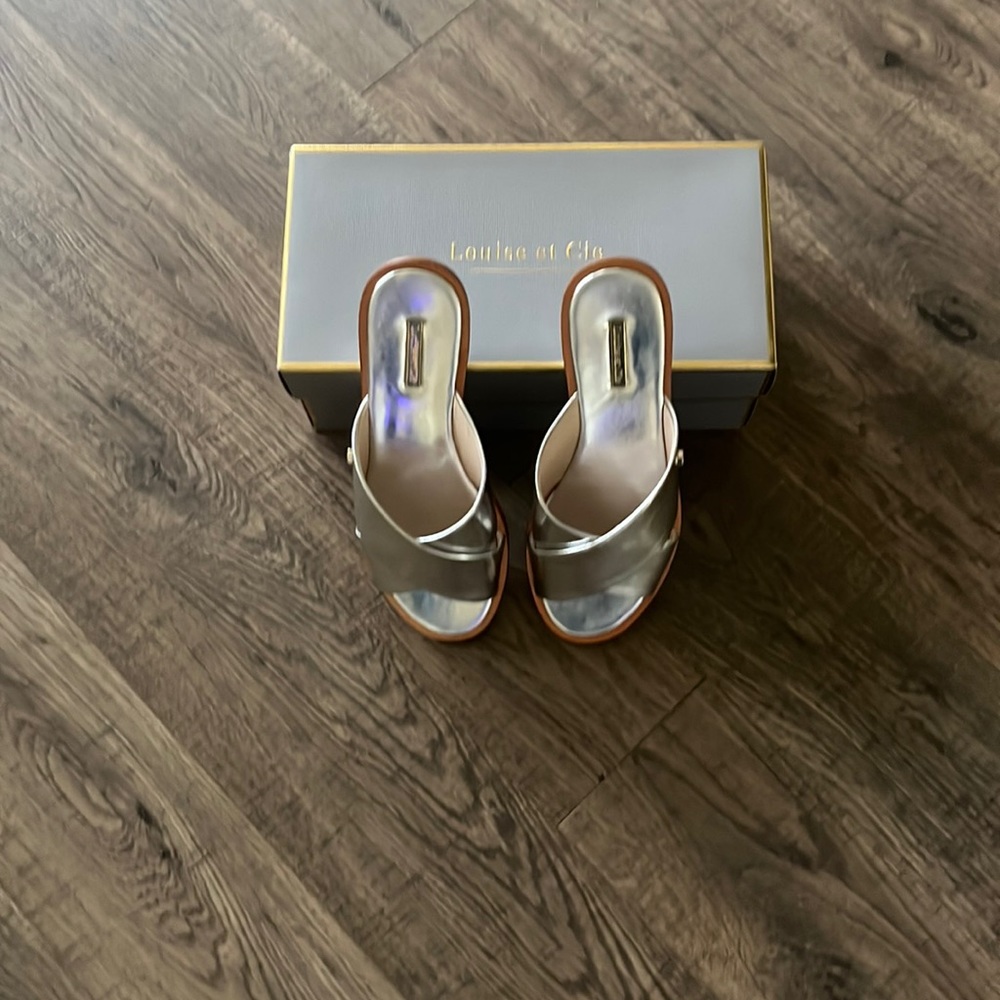 Louise et Cie! Leather Silver Metallic slides with hardware accents. Size 6.5